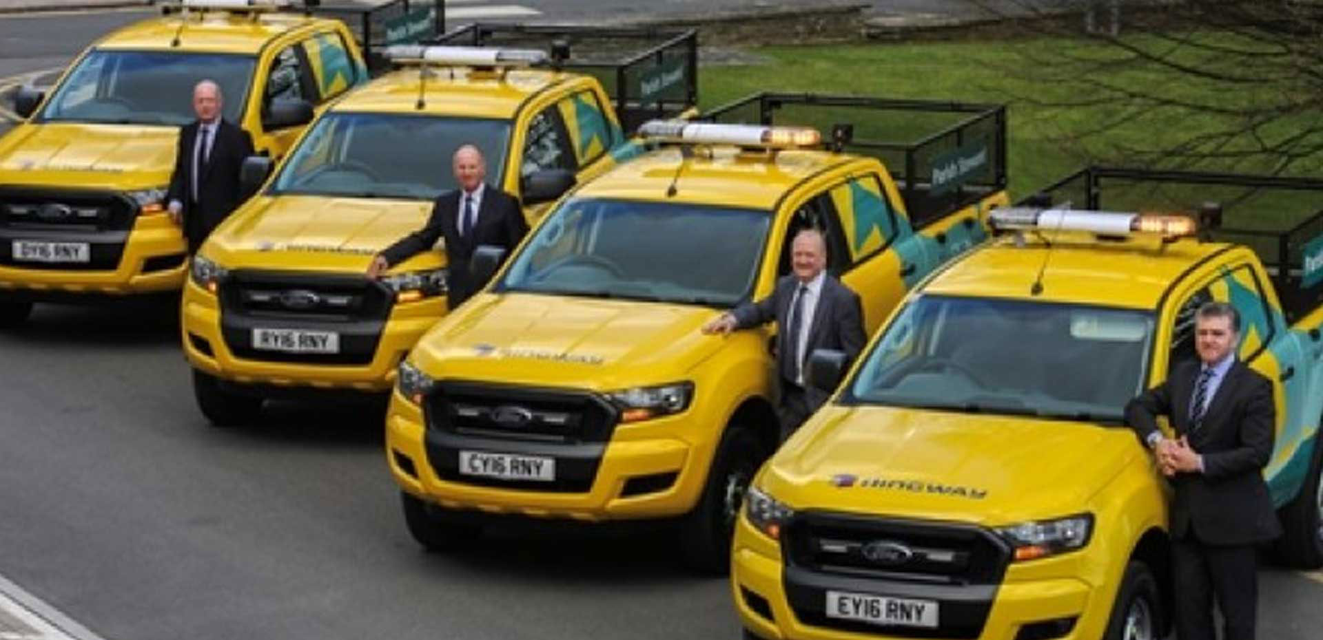 Press image of collection of Parish Steward vehicles